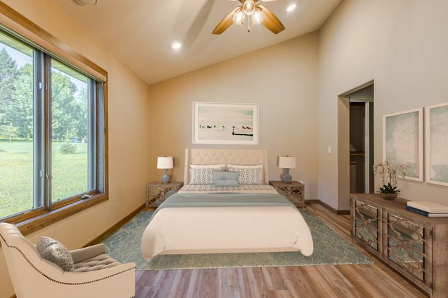 Wake up to a view of the Private backyard. The Primary bedroom has 2 closets;( one is walk-in) A 3/4 Primary bath with double sinks. New Hunter Douglas Window Treatments in all of the rooms | Image 7