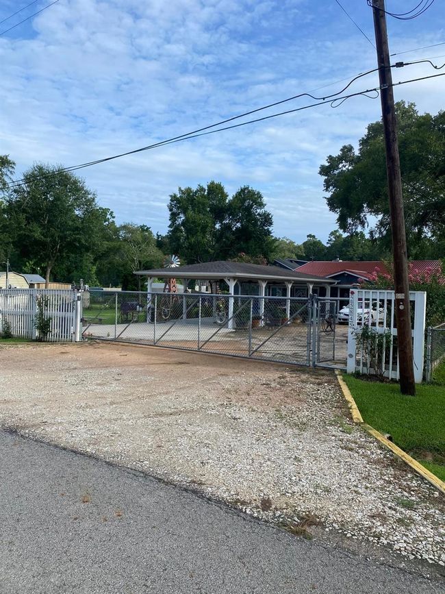 street view of the fully fenced with motorized gate with remote control | Image 16