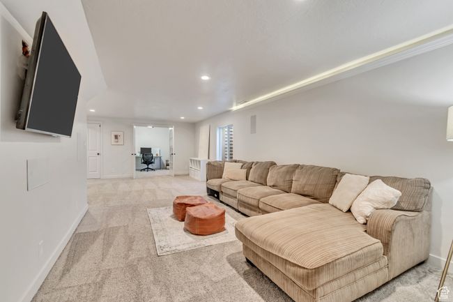 Living room with recessed lighting and light carpet | Image 20