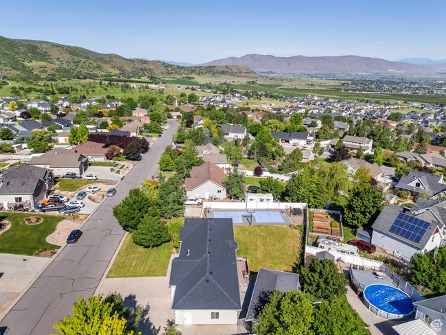 Aerial perspective of suburban area with a mountain backdrop | Image 34