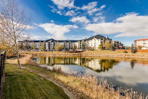 8128-304 Mackenzie Way Sw, Airdrie, AB, T4B3H8 | Card Image