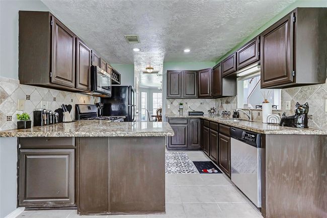 1410 Quiet Green Ct, House other with 3 bedrooms, 3 bathrooms and 2 parking in Houston TX | Image 14