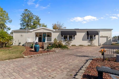 102 Woody Ct, WILDWOOD, FL, 34785-9044 | Card Image