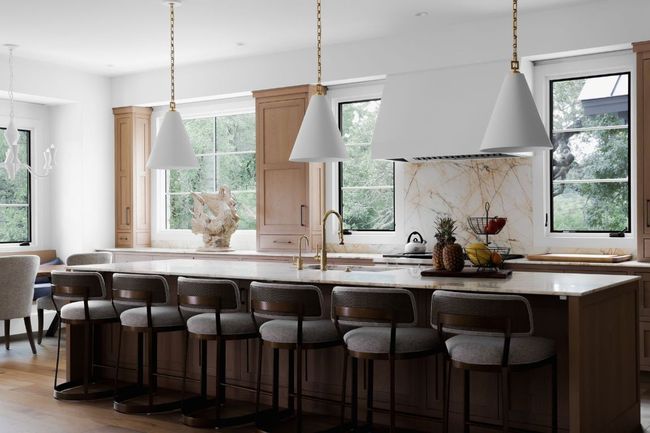Kitchen with backsplash and healthy amount of natural light | Image 13
