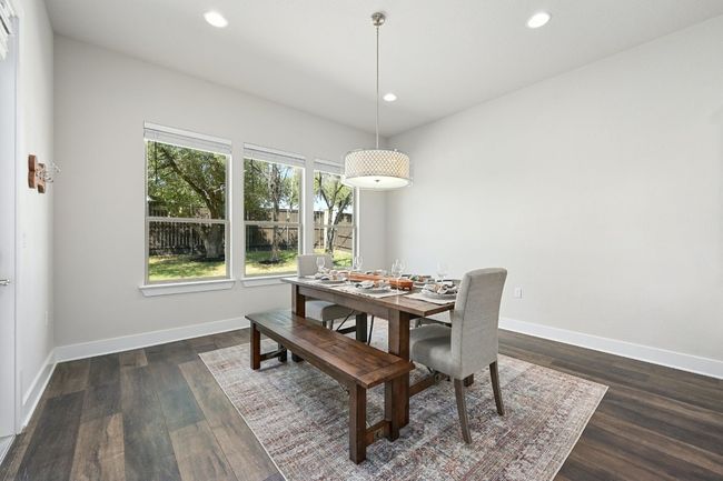 The dining room is a beautifully appointed space designed to enhance your dining experience. | Image 13