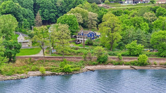 View of subject property with a nearby body of water | Image 9