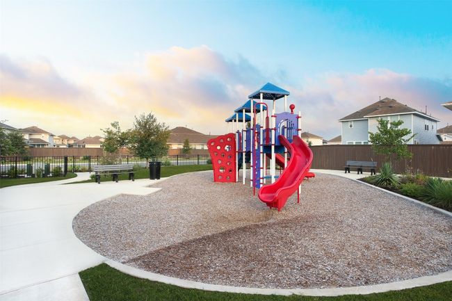 Playground at dusk featuring a residential view, playground community, and fence | Image 5