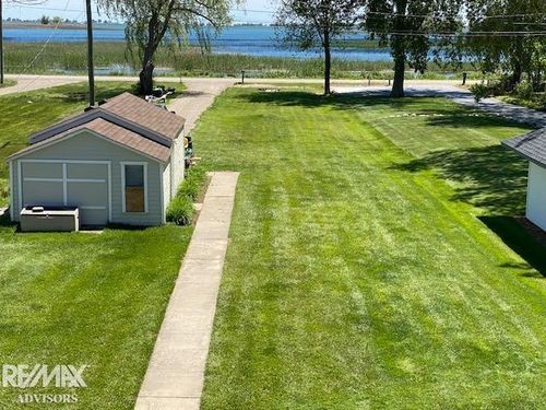 7054 Middle Channel Dr, Harsens Island, MI, 48028-9677 | Card Image