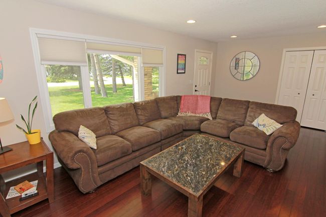 Large living room with tons of natural light. | Image 9