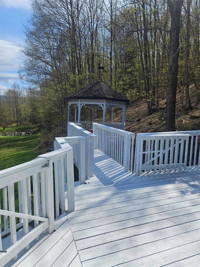 Wooden deck with a gazebo | Image 6
