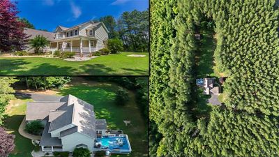 View of front facade with a front lawn and a porch | Image 1