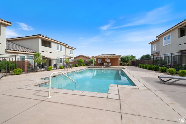 Community pool with a patio | Image 27