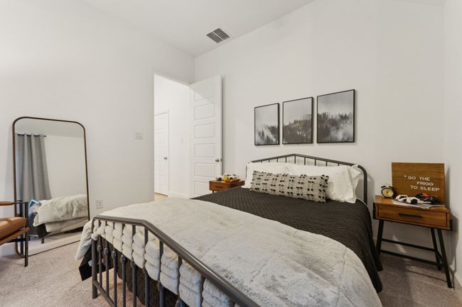 Bedroom with carpet flooring | Image 25