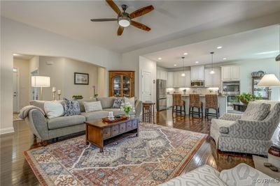 Living room with hardwood / wood-style floors, sink, and ceiling fan | Image 3