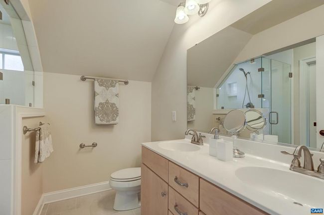 Jack and Jill bathroom with frameless glass shower. | Image 36