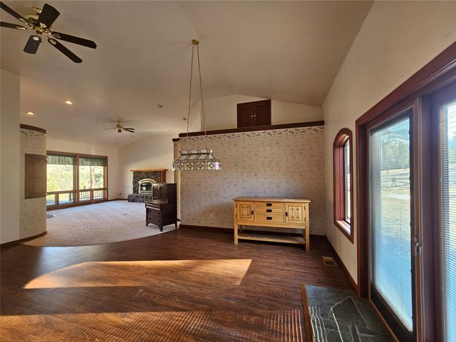 Sliding doors lead to the patio from the dining room. | Image 14