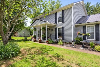 Sharing this beautiful front view of Jewell Drive with wonderful shade trees and lush landscaping | Image 1