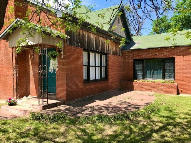 View of side of home featuring brick siding | Image 21