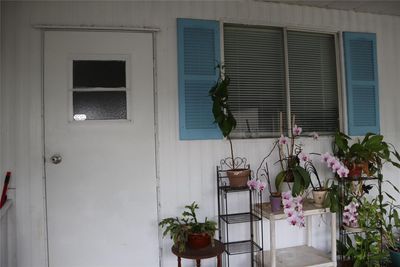 Front door entrance under the carport. | Image 3