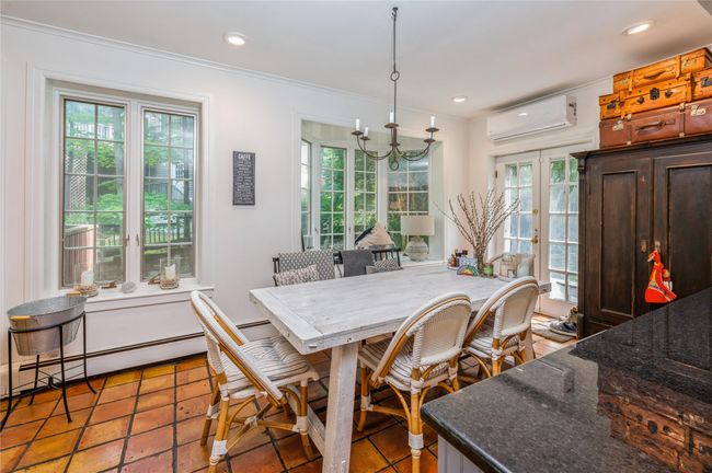 There is also a door to the yard for indoor/outdoor dining. | Image 10