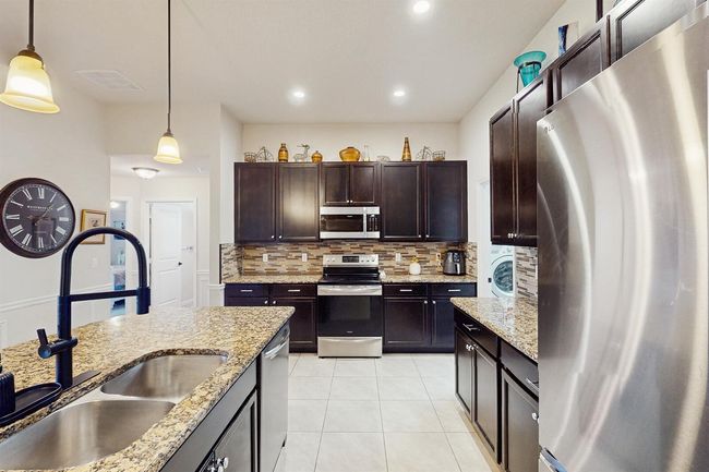 2398 Se Rich St, House other with 4 bedrooms, 3 bathrooms and null parking in Port St. Lucie FL | Image 14