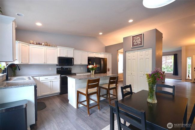 another view of the great space in the kitchen. | Image 15