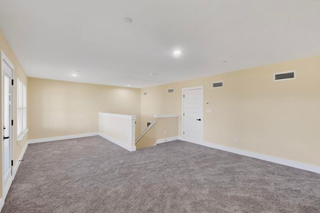 Empty room featuring carpet flooring and recessed lighting | Image 30