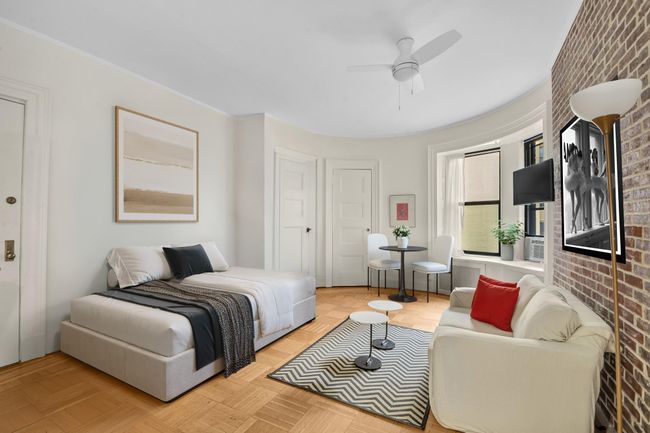 Reimagined living space with sofa, table and daybed | Image 4