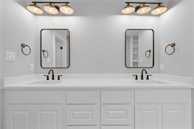Bathroom featuring vanity | Image 19