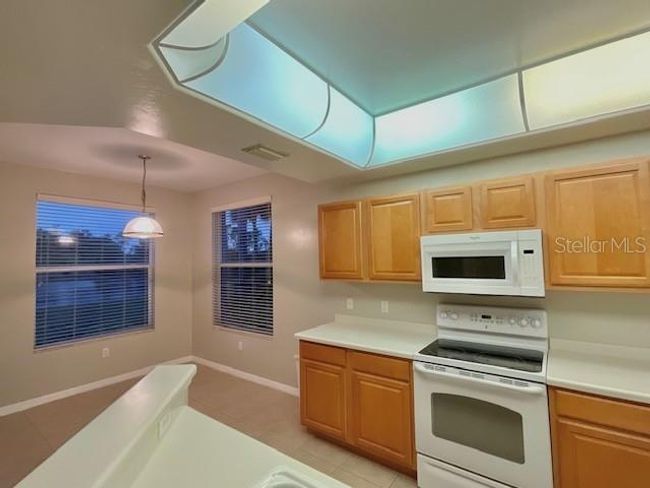 Kitchen looking into Breakfast Area | Image 25