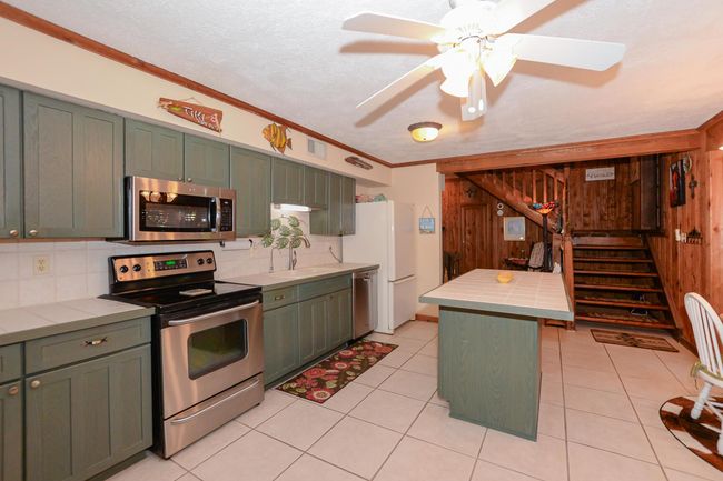 576 Sw Rustic Cir, House other with 3 bedrooms, 2 bathrooms and null parking in Stuart FL | Image 11