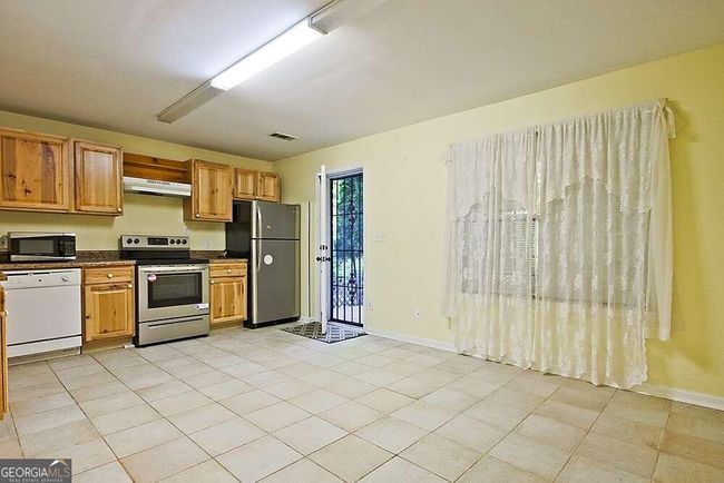 770 Walnut Creek Dr Nw, House other with 5 bedrooms, 4 bathrooms and 4 parking in Lilburn GA | Image 47