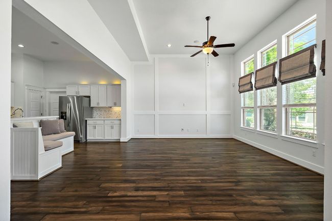 Living room featuring recessed lighting, ceiling fan, and dark wood-style flooring | Image 5