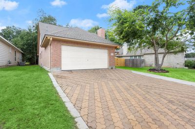 Widened driveway allows for additional parking. | Image 2