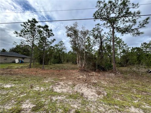445 Jaguar Blvd, LEHIGH ACRES, FL, 33974-2641 | Card Image