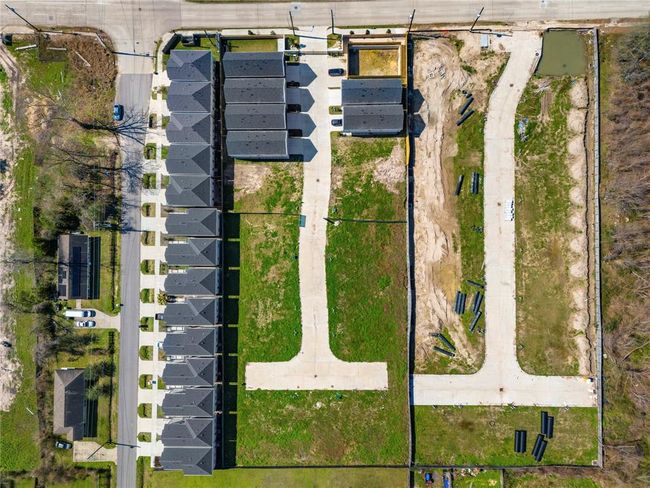 Bird’s-eye view of this thriving development, showcasing completed modern homes alongside prime lots ready for new construction. A fantastic opportunity in a growing community with excellent accessibility. | Image 30