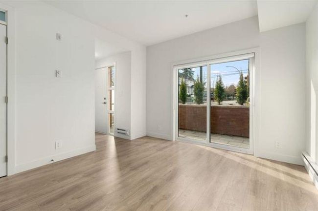 Empty room featuring light wood-type flooring and baseboards | Image 7