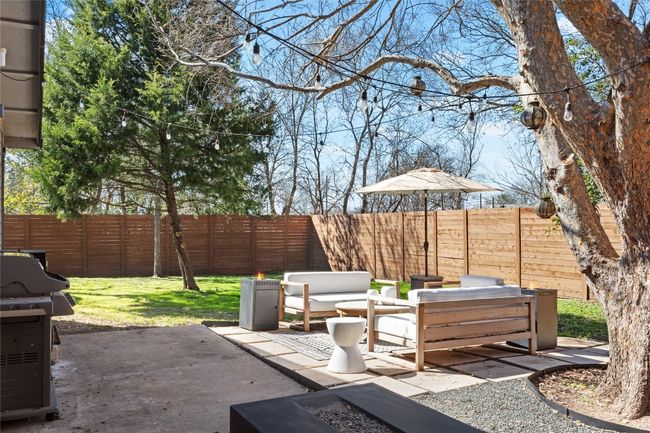 View of patio with an outdoor living space and a grill | Image 39