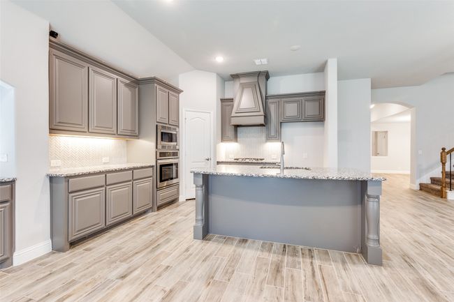 Plenty of space for the kids to eat breakfast on the island in the morning | Image 11