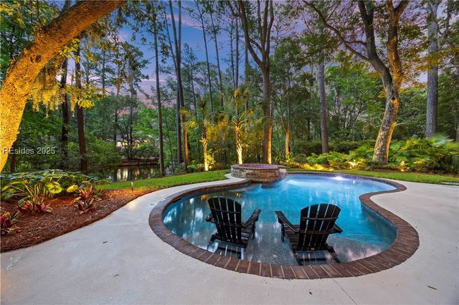 Pool deck with landscape lighting | Image 59