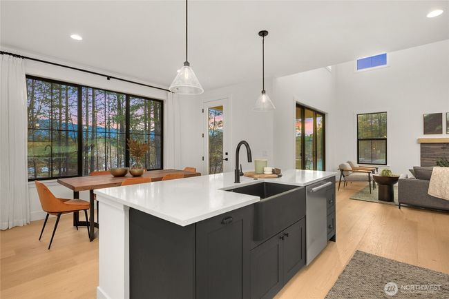 As the newest PNW master-planned community, enjoy 200+ acres of open space, trails & the Coal Trax Mt Bike Park. Soaring ceilings in the great roommake each day worthy of celebration & open floorplan appeals to entertaining. Covered deck & patio. Southern-facing homesites range from the mid600s- 900ks. Enjoy a variety of innovative & distinctive new home options with the best all-season recreation just moments away! Built for the future, indulge in a retreat just 90-min to Seattle. Plans and elevations are artist’s renderings only, may not accurately represent the actual condition of a home asconstructed and may also contain options and upgrades which are not included in the sale. Trailside Homes reserves the right to make changes to the floorplan, specifications, dimensions, design and elevations without prior notice. Stated dimensions and square footage are estimated and should not be usedas representations of the home’s actual size. | Image 25