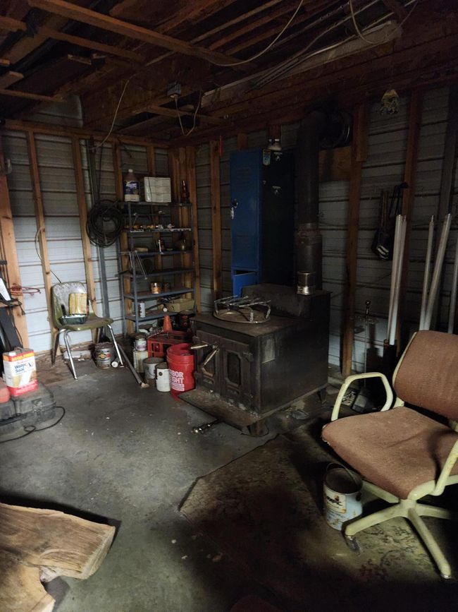 shop lower level with stove | Image 34