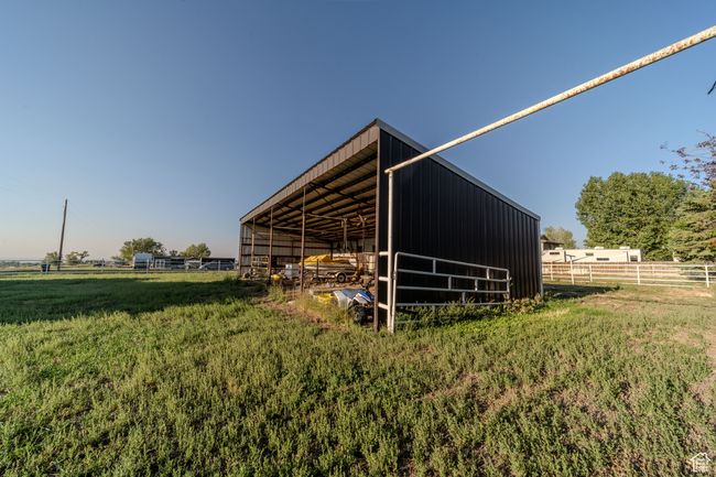 View of pole building featuring a rural view and access to the main home property | Image 32