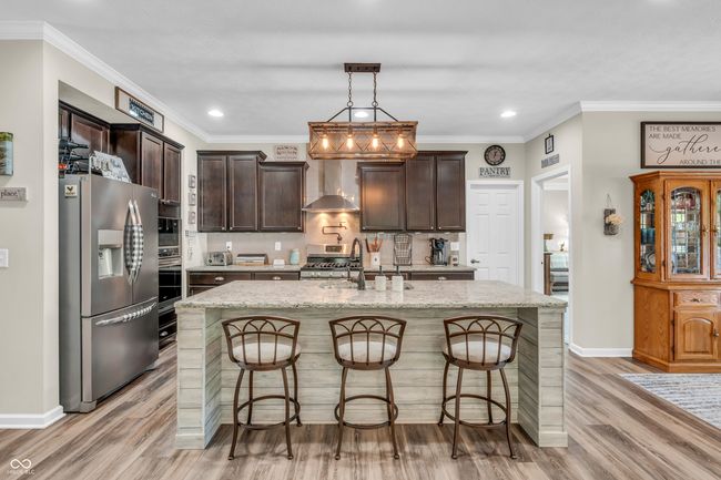 chimney vent, pot filler, tiled backsplash, oven/range - gas , built in oven and more | Image 29