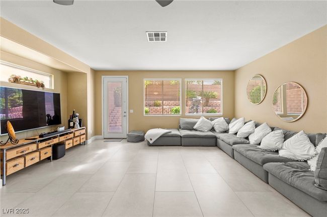 Living room with baseboards | Image 5