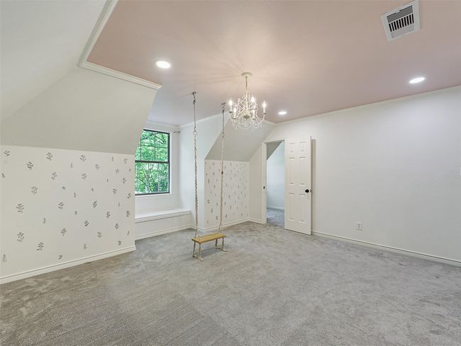 Additional living space with vaulted ceiling, visible vents, and recessed lighting | Image 27