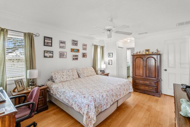 Master Bedroom w/ Walk in Closet, Door to the Lanai & Ensuite w/ Tiled Shower, Separate Garden Tub & Water Closet | Image 4