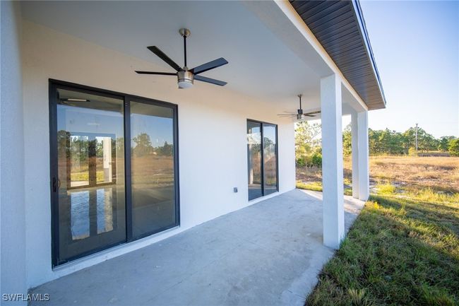 View of patio / terrace featuring ceiling fan | Image 20