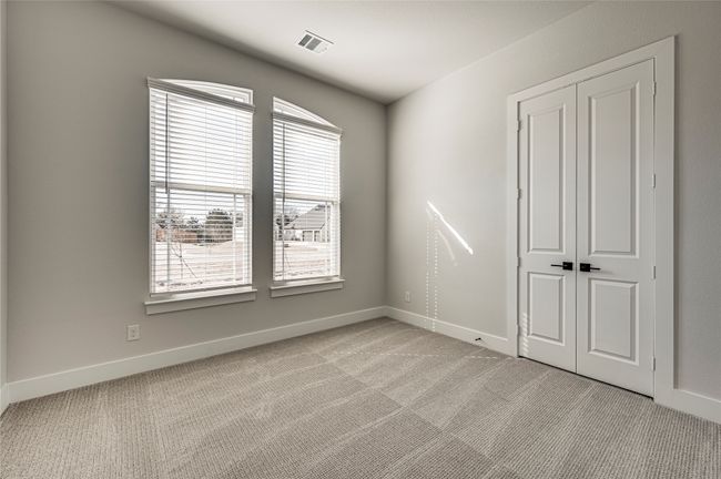 Spare room with visible vents, baseboards, and light carpet | Image 23