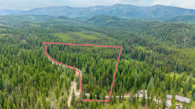 View of property location featuring mountains and property parcel outlined | Image 12